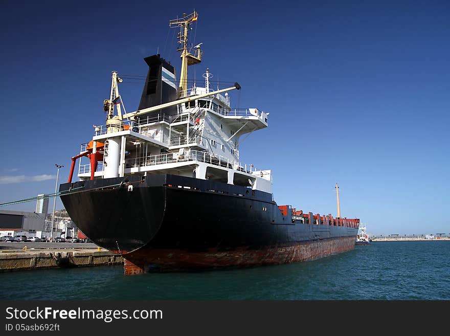 General cargo ship working in the port of Alicante; Spain.