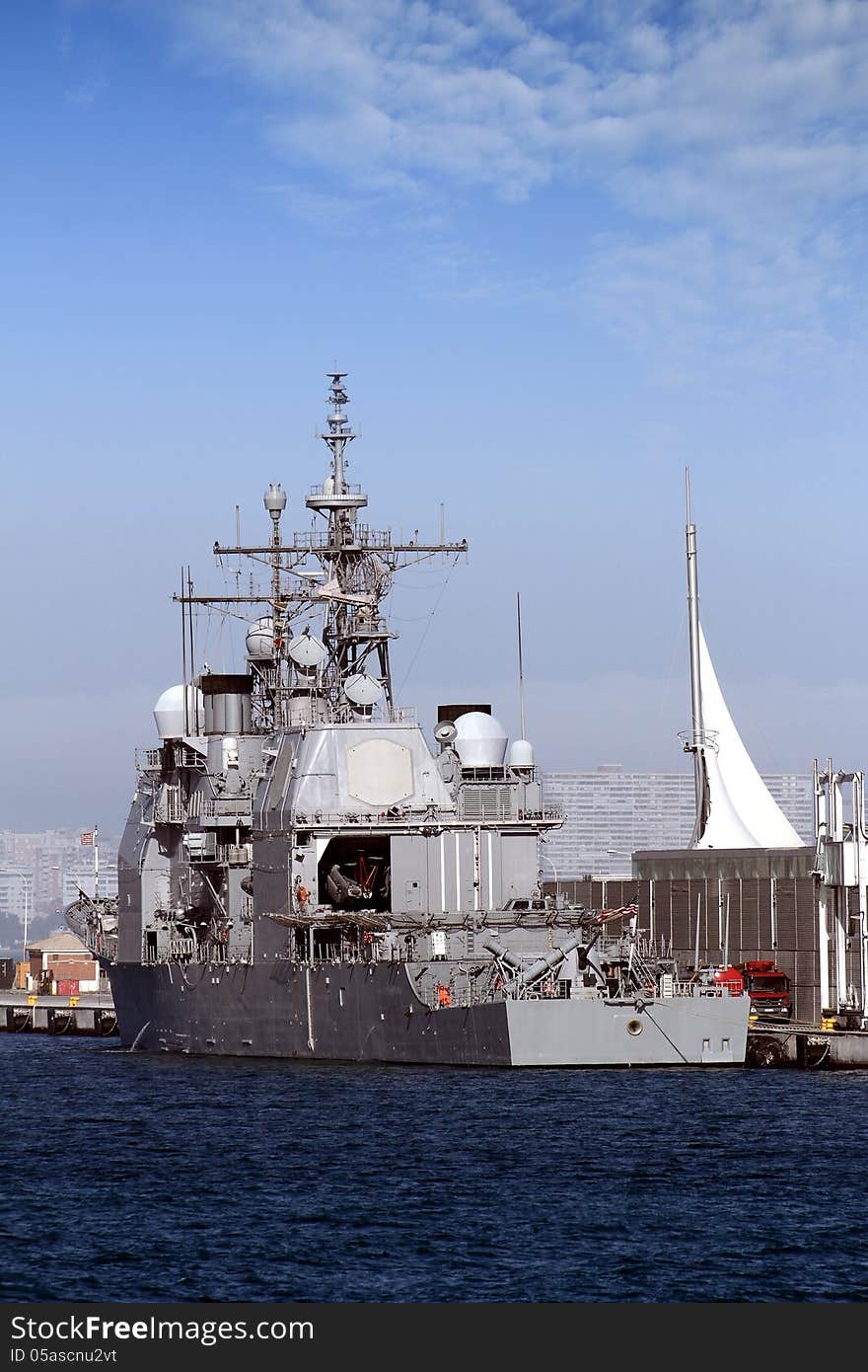 Ticonderoga class cruise docked in port. Ticonderoga class cruise docked in port.