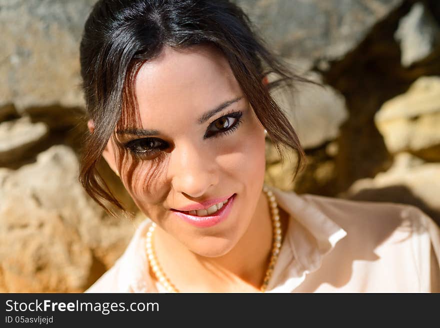 Young Beautiful Woman In A Urban Background