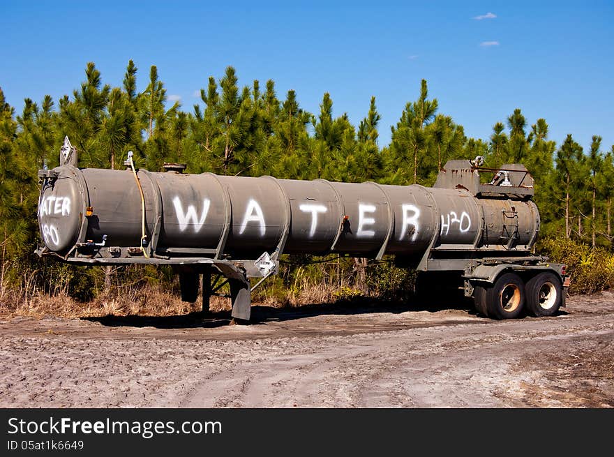 Water tender being used for logging.