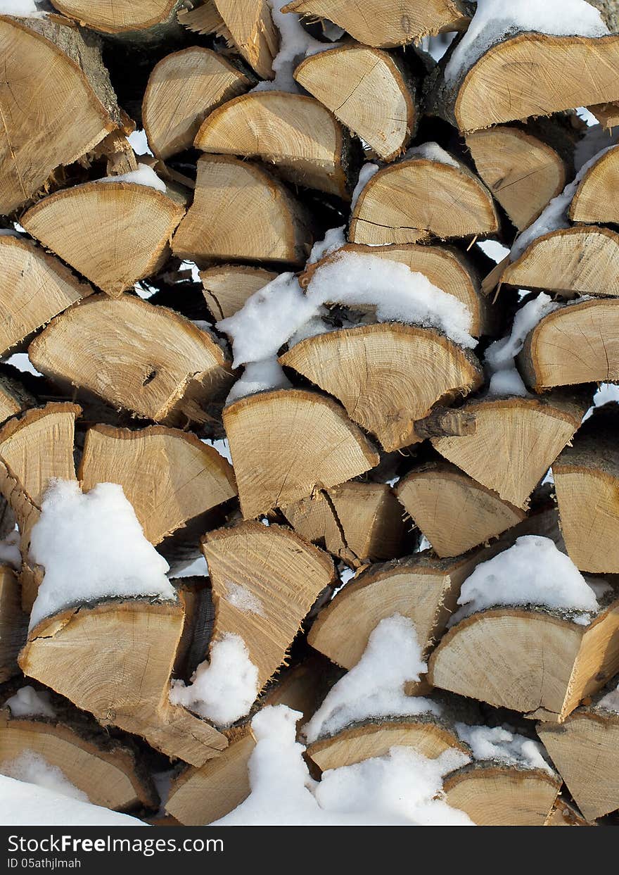 Cut and split oak firewood for a long winter