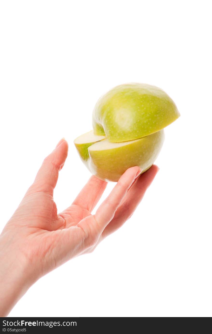 Female hand holdin apple. White background. Studio shot. Female hand holdin apple. White background. Studio shot