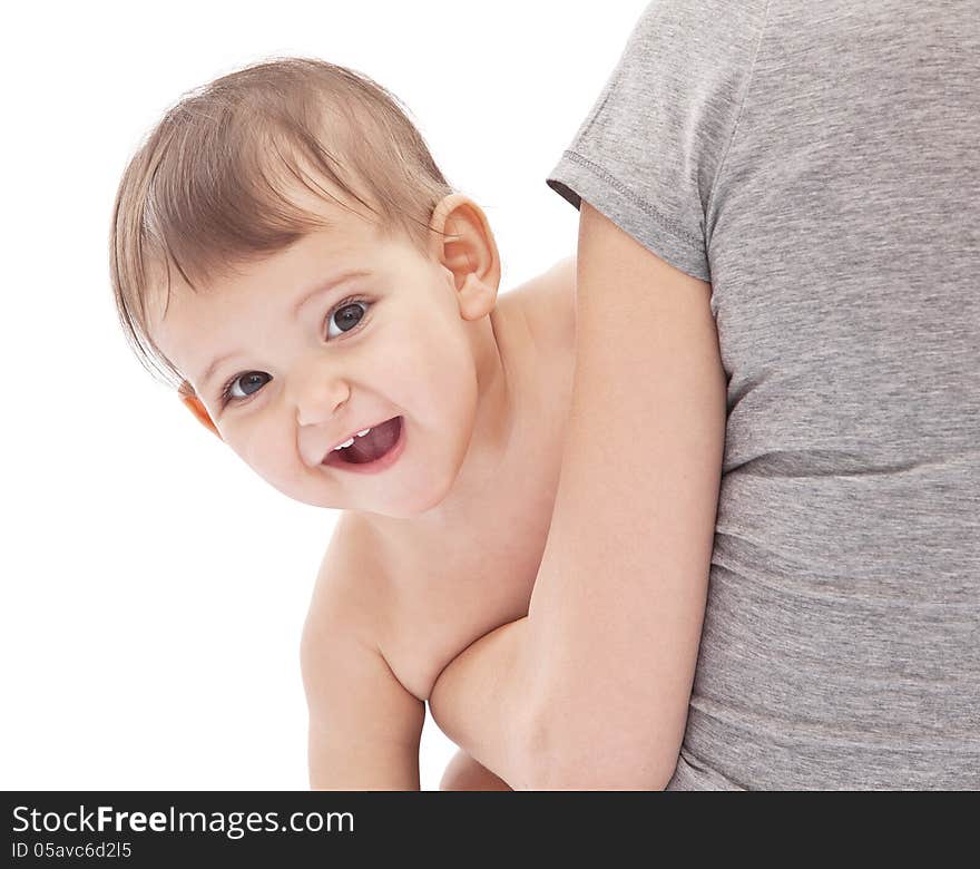 Smiling baby on mum's hands. Isolated on a white background. Smiling baby on mum's hands. Isolated on a white background.