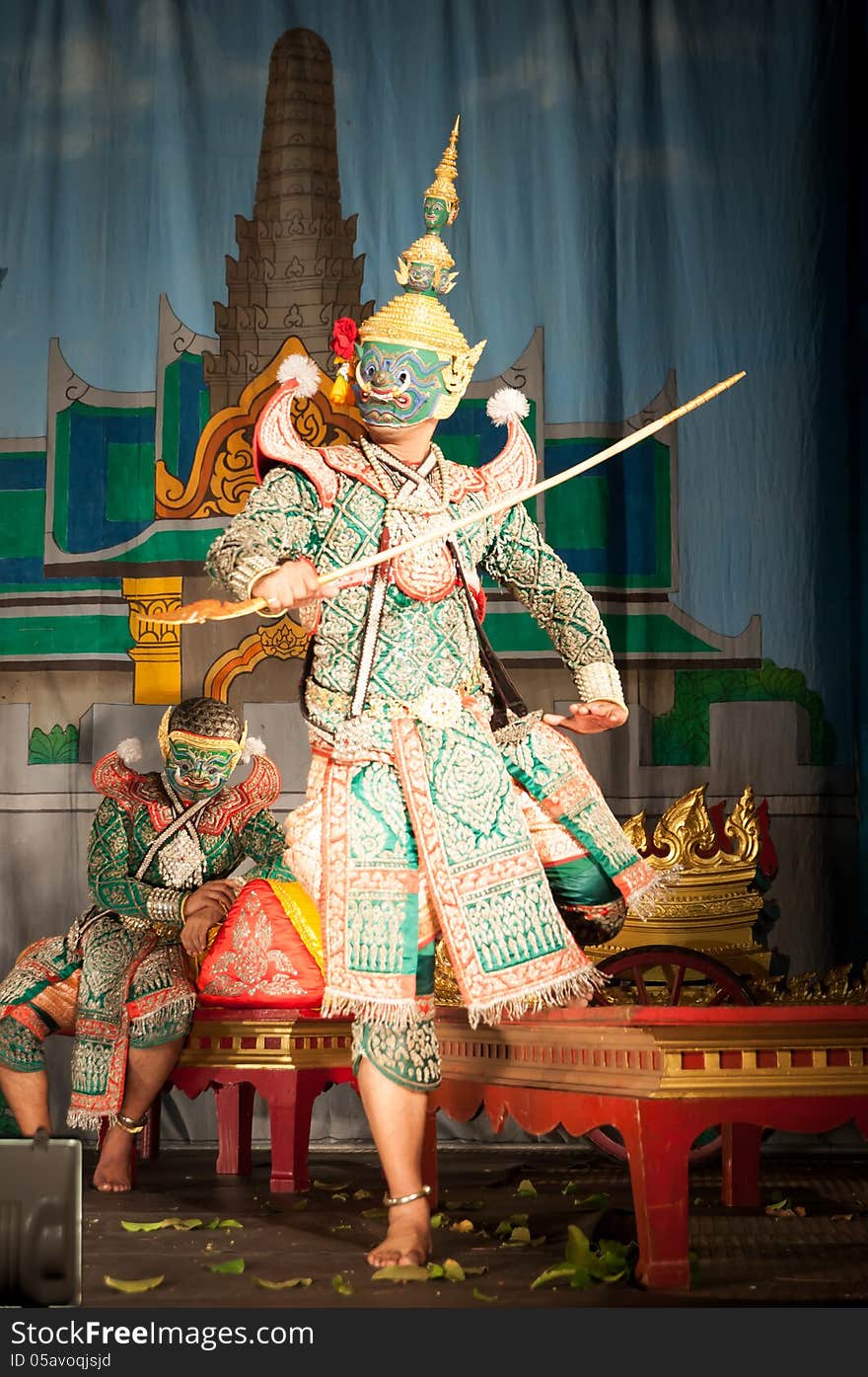 Lamphun, THAILAND - March 19: Thai Traditional Dress. actors performs Thai ancient dancing Art of Khon-Thai classical masked ballet in Thailand, March 19, 2013 in Lamphun, Thailand