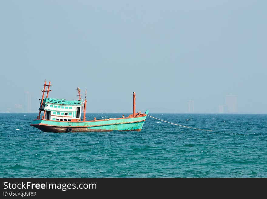 Green Fishing boat on the sea