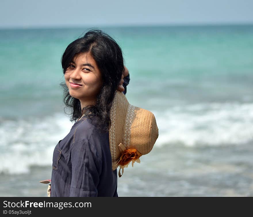 Portrait of asian woman on beach