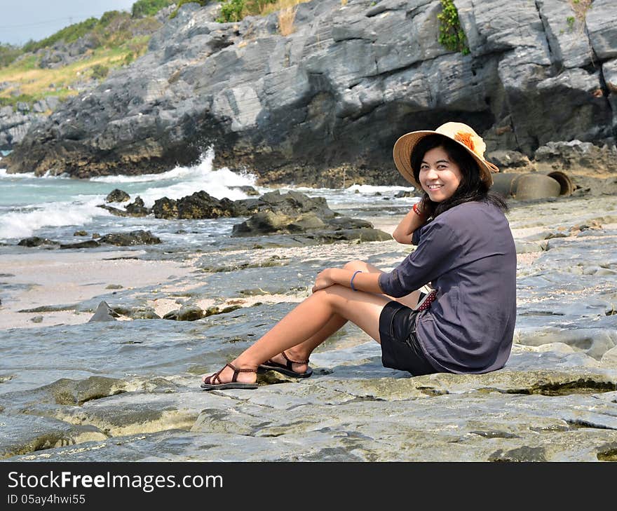 Beautiful young woman on beach