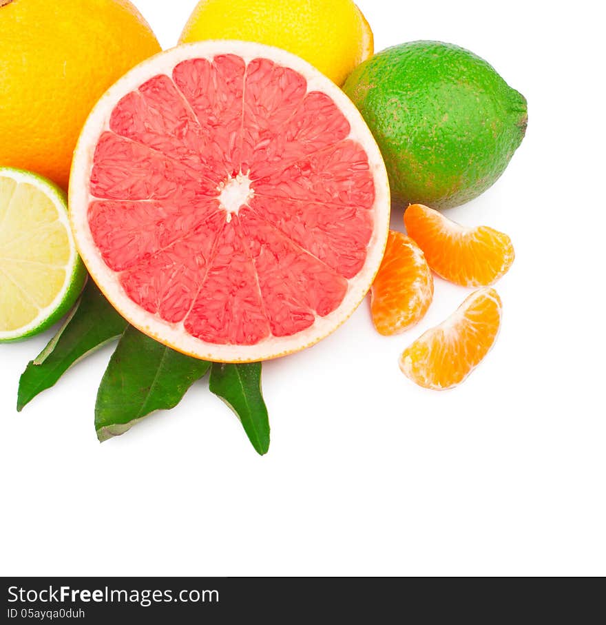 Fresh citrus fruits whole and half with green leaves, food ingredient photo