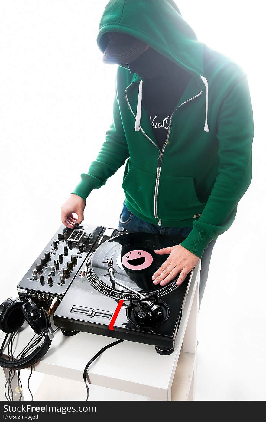 DJ on the white background with mixer. DJ on the white background with mixer