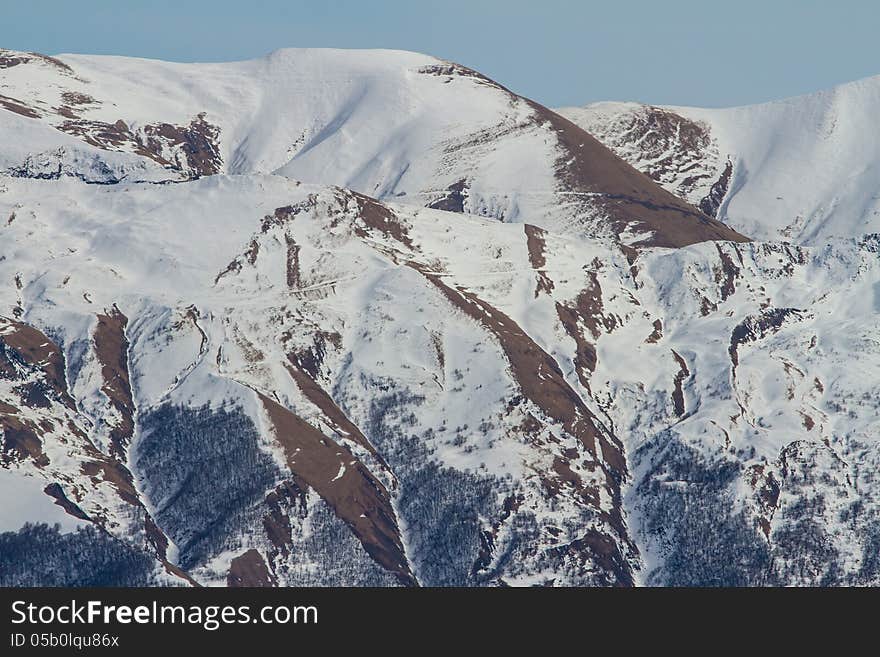 Winter mountains in the clouds