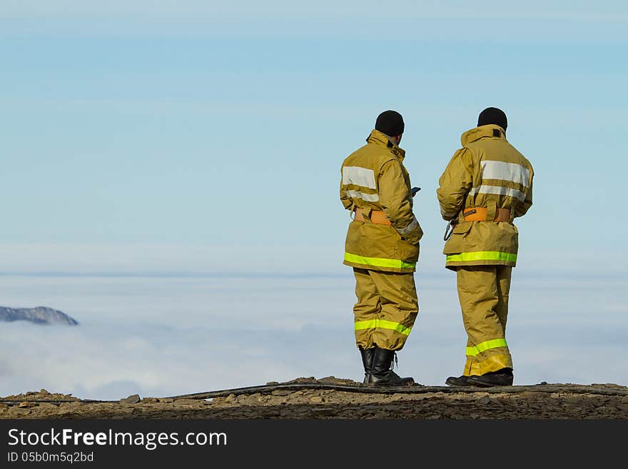 Two men on the top of the mountain