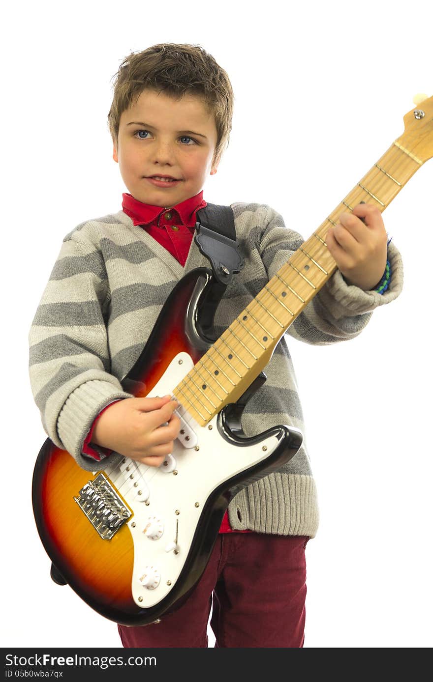 Little kid rocking on a electric guitar. Little kid rocking on a electric guitar