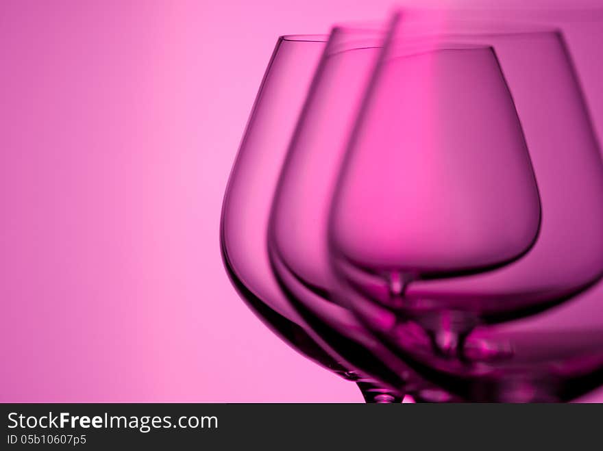 Set of empty brandy goblets. Studio shot. Set of empty brandy goblets. Studio shot