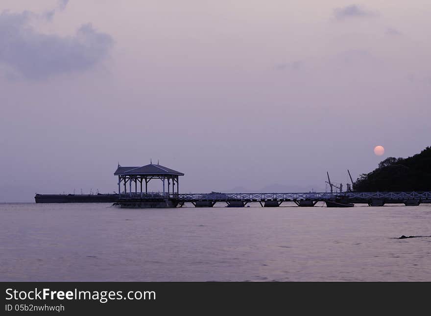 Sunrise at beautiful old bridge on Sichang island , chonburi pro