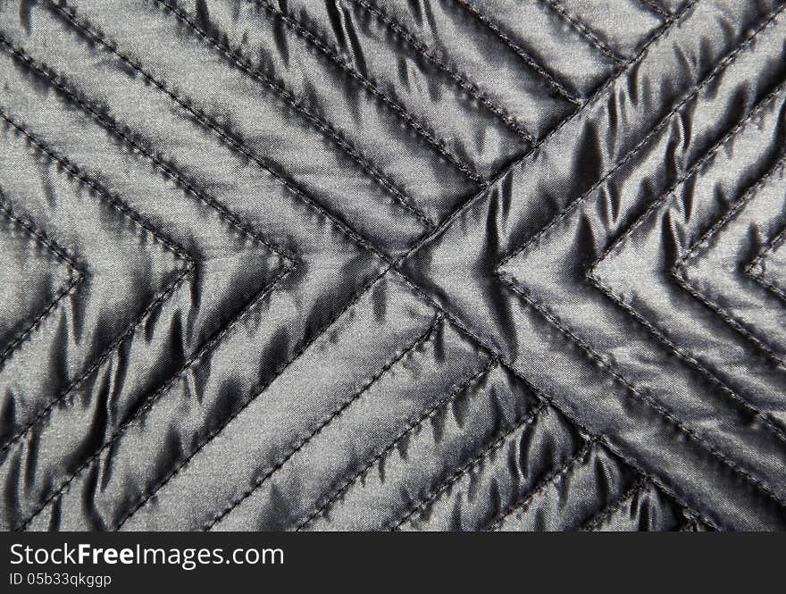 Quilted cloth texture close-up