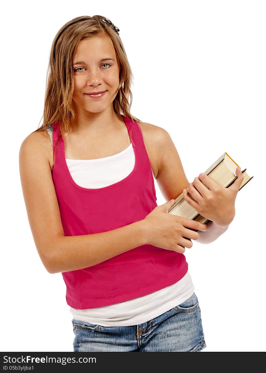 Vertical shot of a young teenager smiling at the camera while holding books. Isolated on a white background. Shot in studio. Vertical shot of a young teenager smiling at the camera while holding books. Isolated on a white background. Shot in studio.