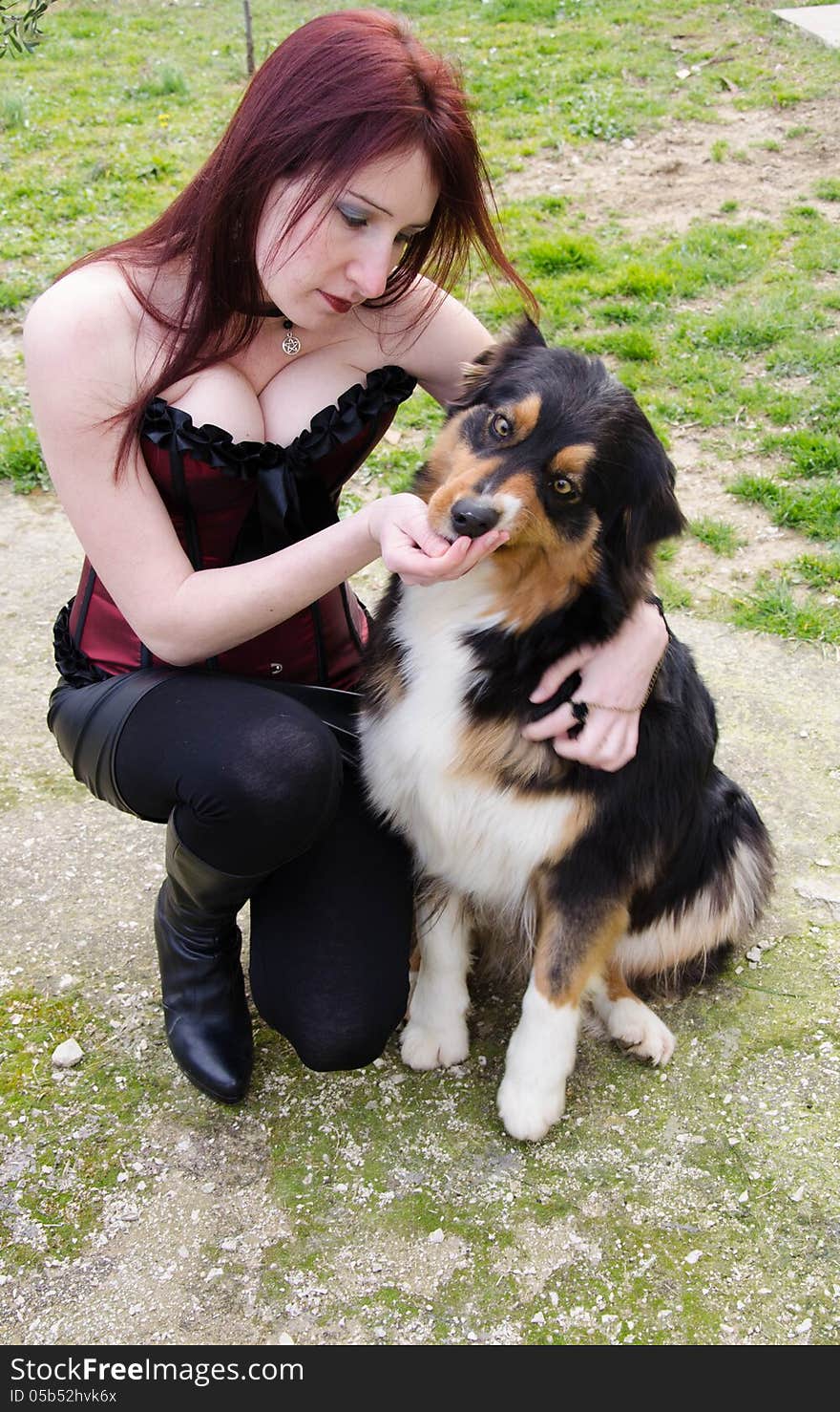 Young Woman With Australian Shepherd Dog