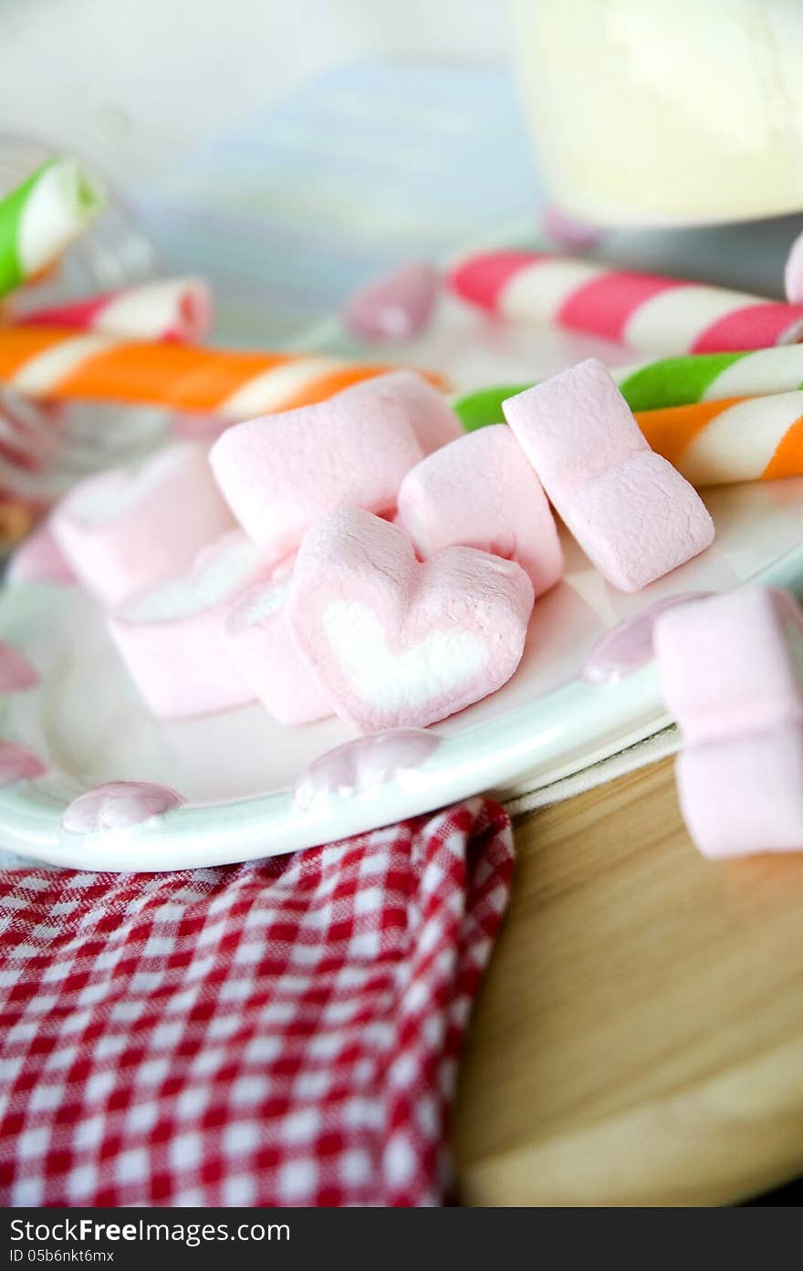 Pink heart marshmallow put on cute plate