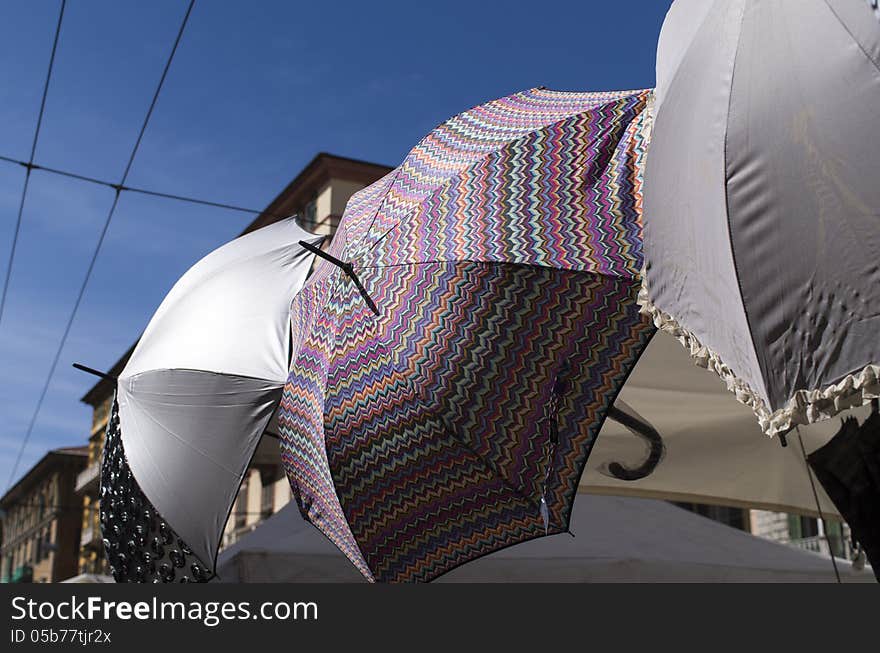 Some colored umbrella at market