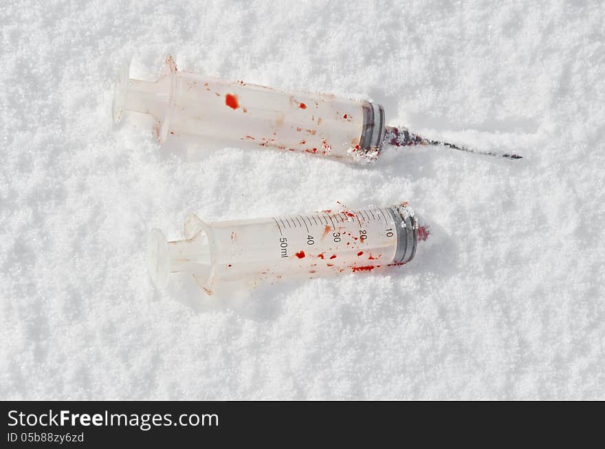 Bloody Used Syringes