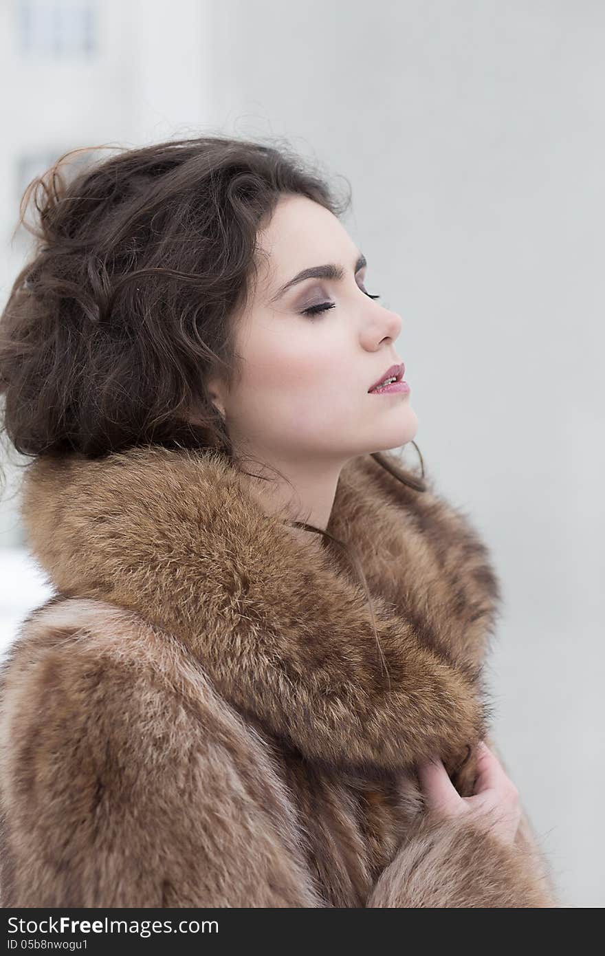 Pretty Woman in Fur Coat in Reverie. Serene. Pretty Woman in Fur Coat in Reverie. Serene