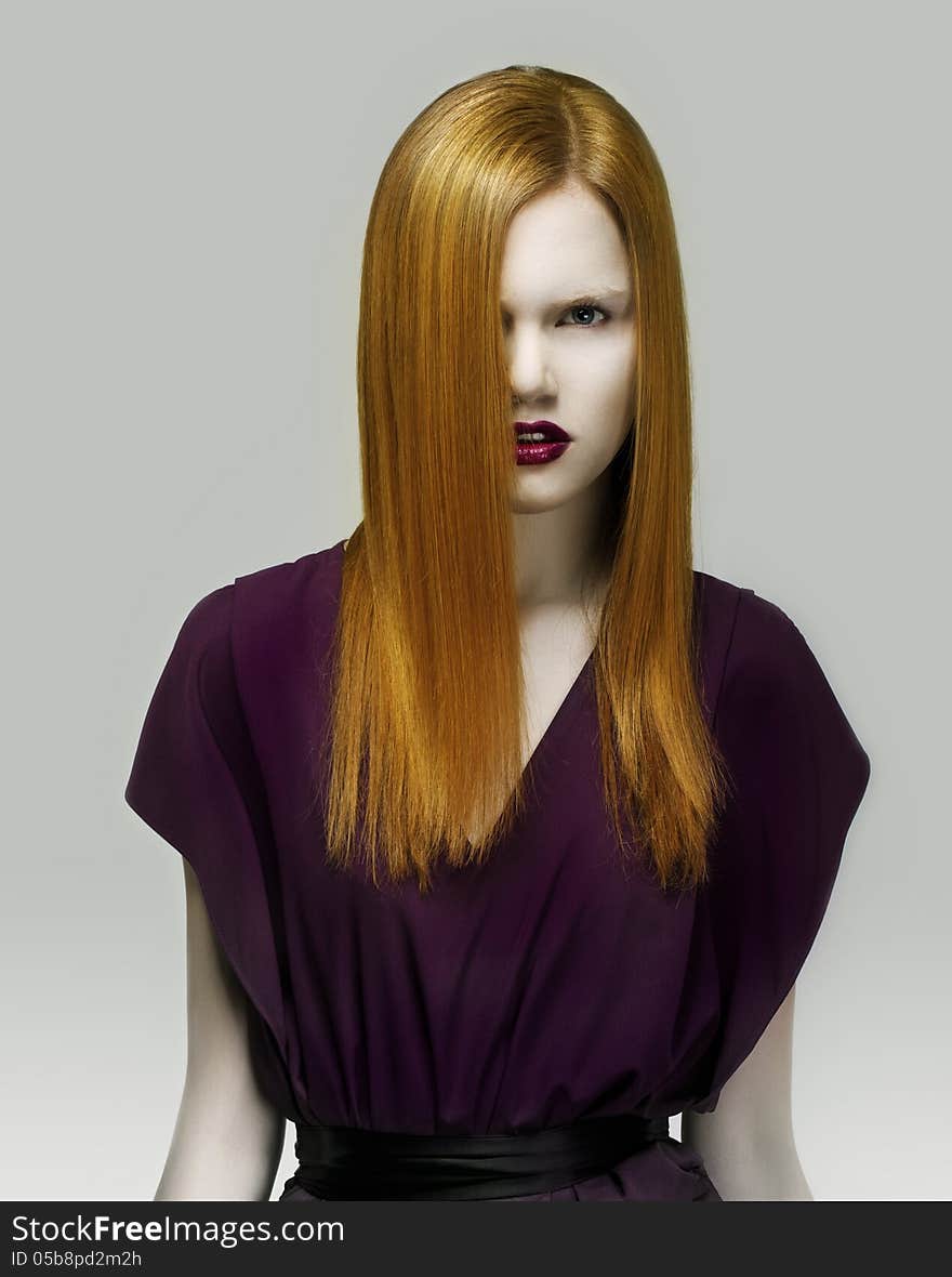 Stare. Exquisite Golden Hair Stylish Woman in Violet Dress. Arrogance