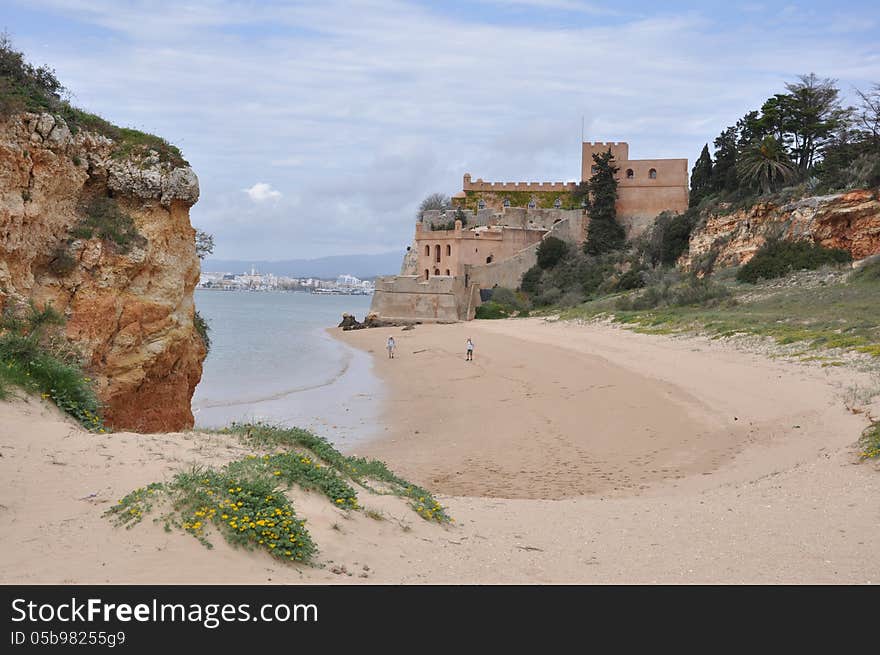 Beach of Portimao with castle, Algarve, Portugal, Europe. Beach of Portimao with castle, Algarve, Portugal, Europe