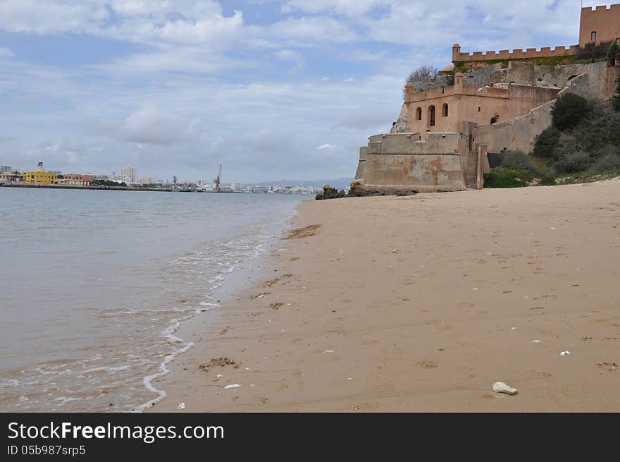 Beach of Portimao with castle, Algarve, Portugal, Europe. Beach of Portimao with castle, Algarve, Portugal, Europe