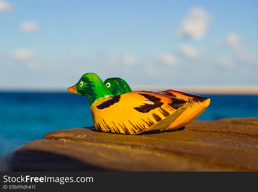 Wooden figurines mandarin duck. symbol love