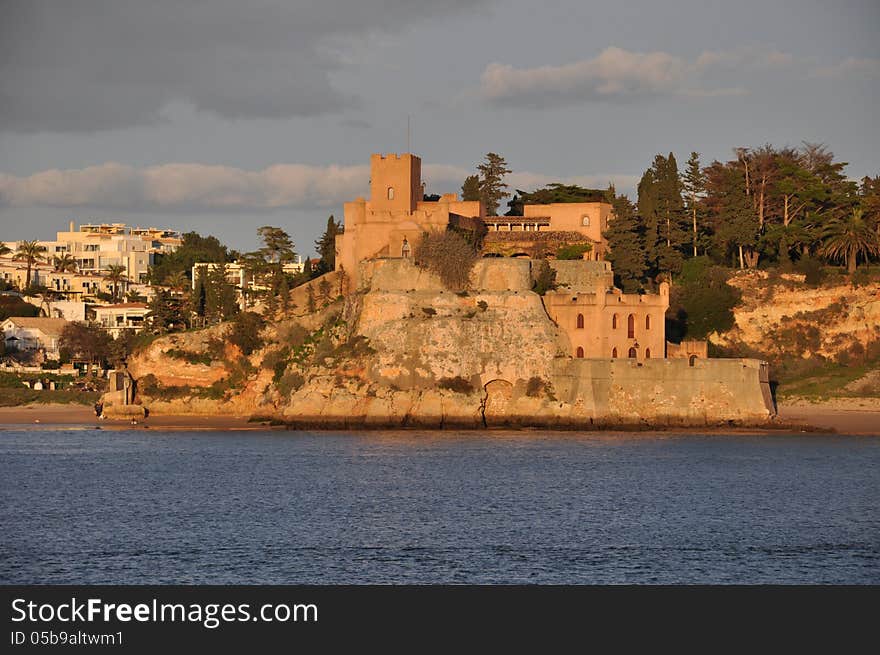 Beach of Portimao with castle, Algarve, Portugal, Europe. Beach of Portimao with castle, Algarve, Portugal, Europe