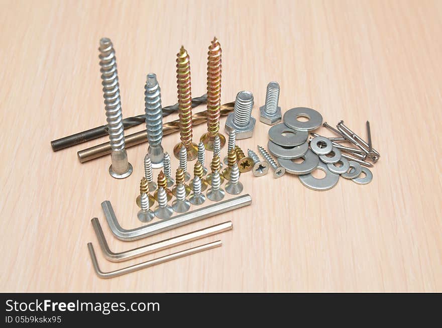 Different screws washers bolts and nails. Different screws washers bolts and nails