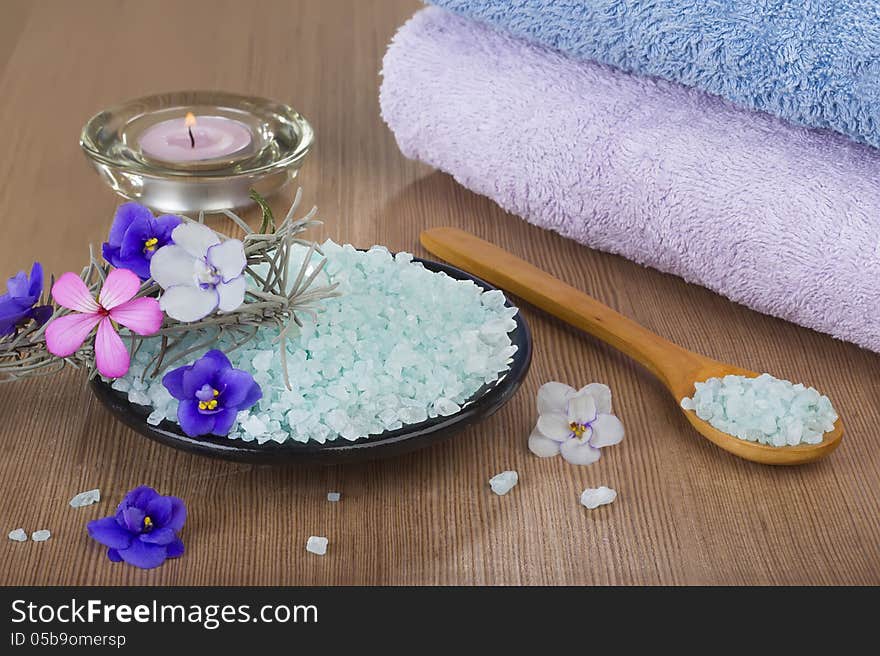 Aromatic spa set with sea salt and colored candles.