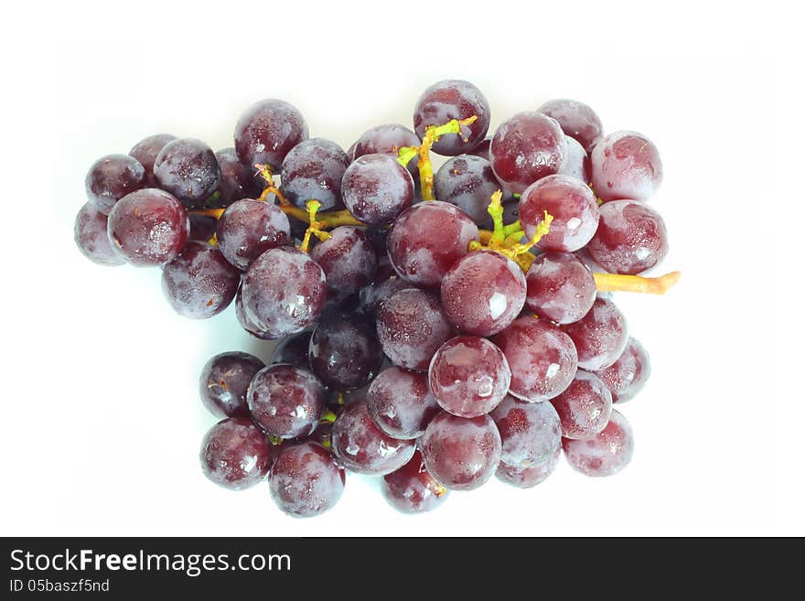 Red grape on white background