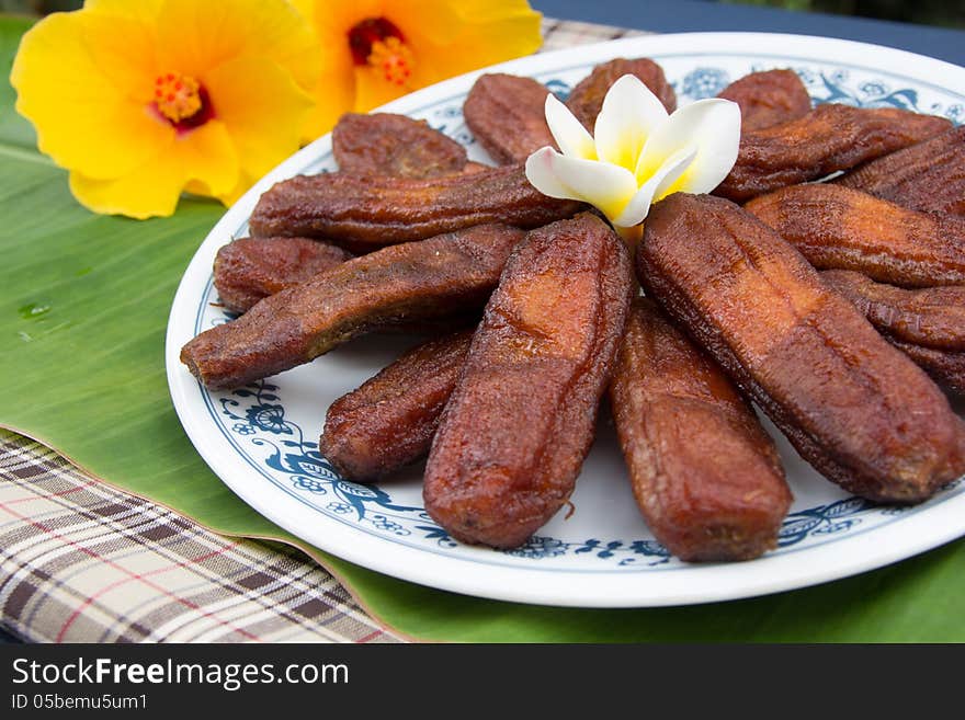 Dry banana bake with honey on plate