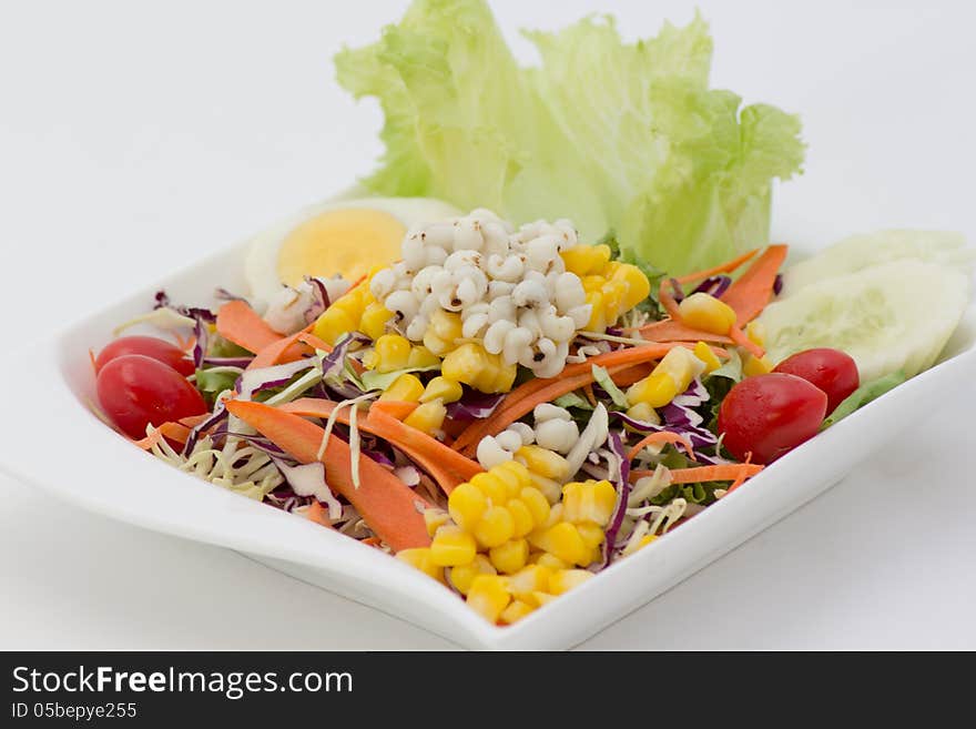 Fresh salad in ceramic bowl