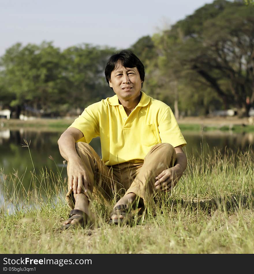 Asian Middle-aged Man In The Park