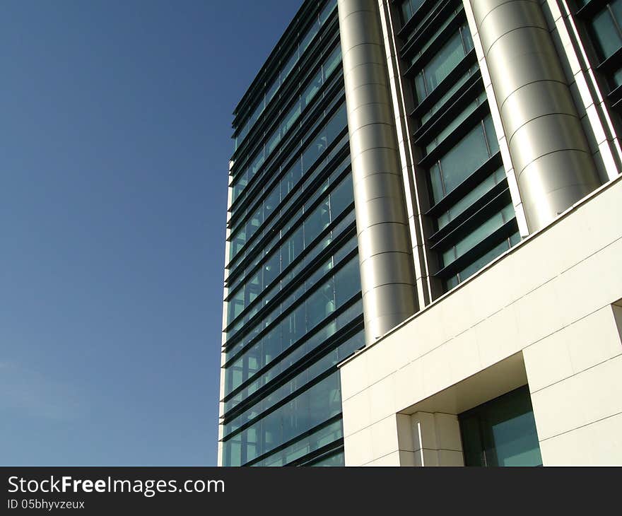 Corner of modern building and bright columns