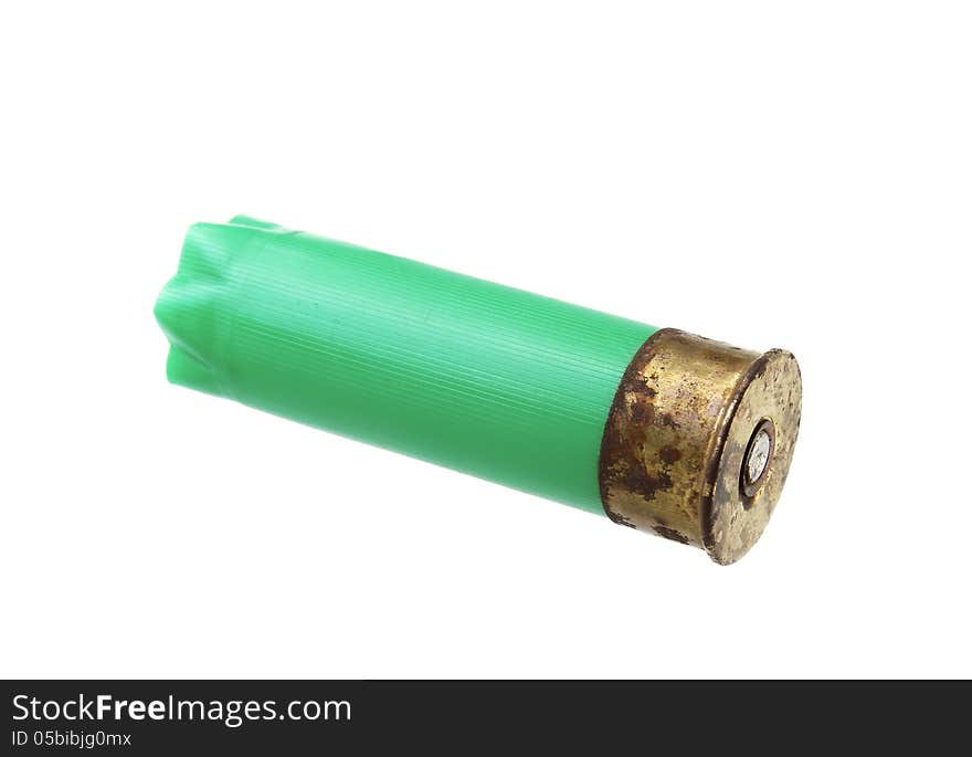 Green shotgun shell isolated on white background