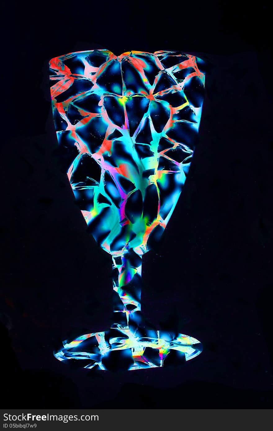 Composition of a party-beaker consisting of transparent plastic seen in polarized light with a bit of security-glass that has been damaged. Composition of a party-beaker consisting of transparent plastic seen in polarized light with a bit of security-glass that has been damaged