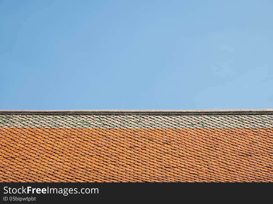 Buddhist temple ceramic roof and the blue sky