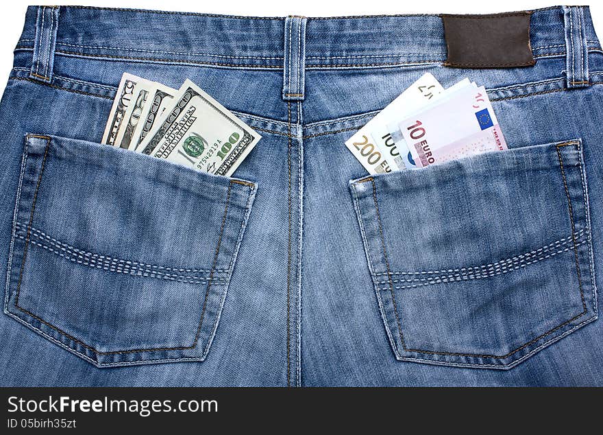 Jeans with a different currency in their pockets - a symbol of balance between the euro and the dollar. Jeans with a different currency in their pockets - a symbol of balance between the euro and the dollar