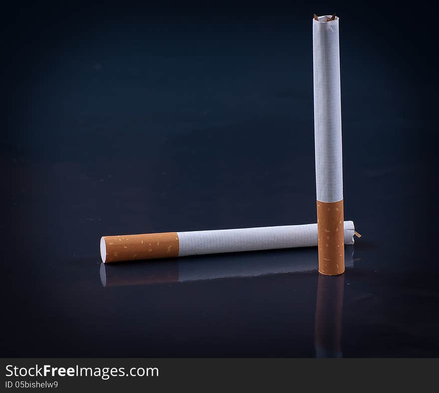 Cigarette on black background