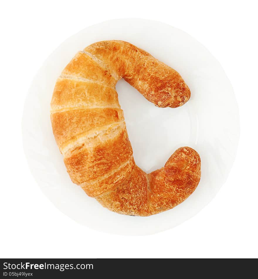 Fresh And Tasty Croissant On Plate Isolated On White Background