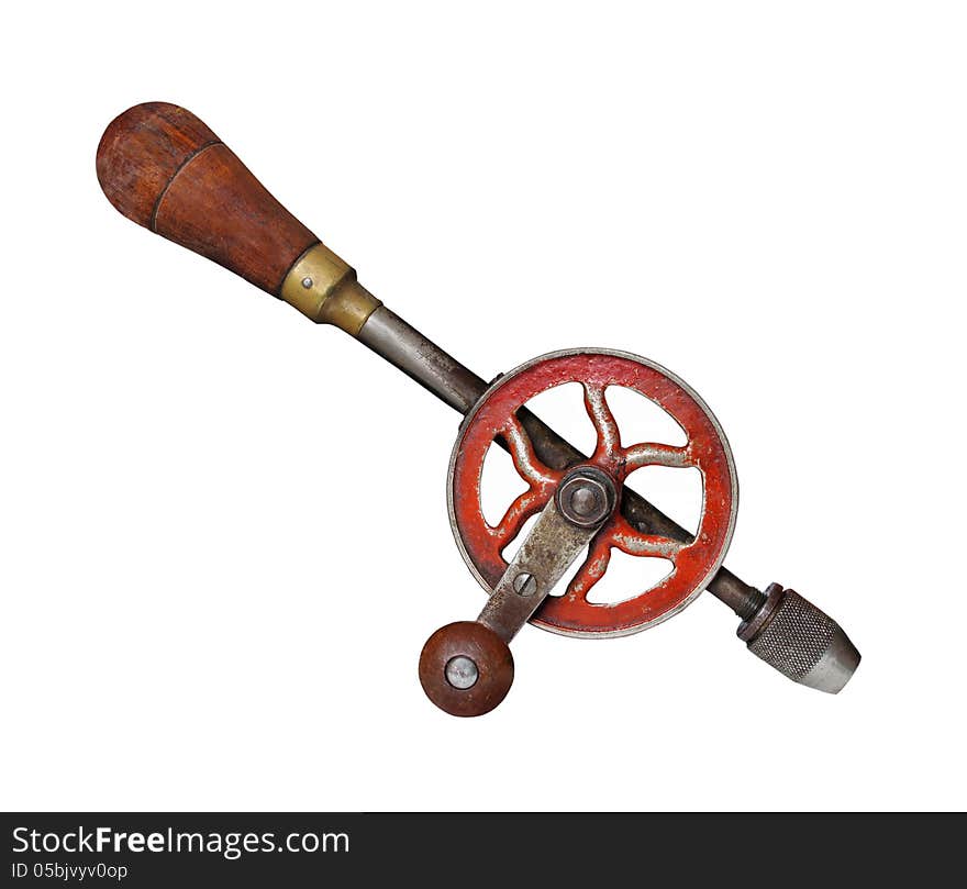 Old and worn antique hand turned manual wood drill. Isolated on white. Old and worn antique hand turned manual wood drill. Isolated on white.