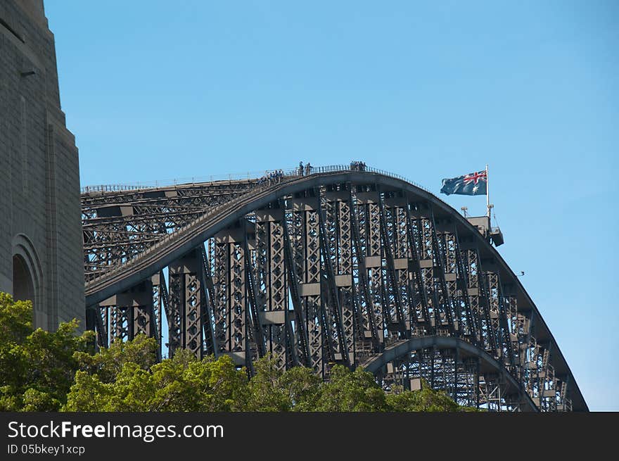 Adventure seekers climb the famous bridge for a birds eye view of the harbor. Adventure seekers climb the famous bridge for a birds eye view of the harbor.