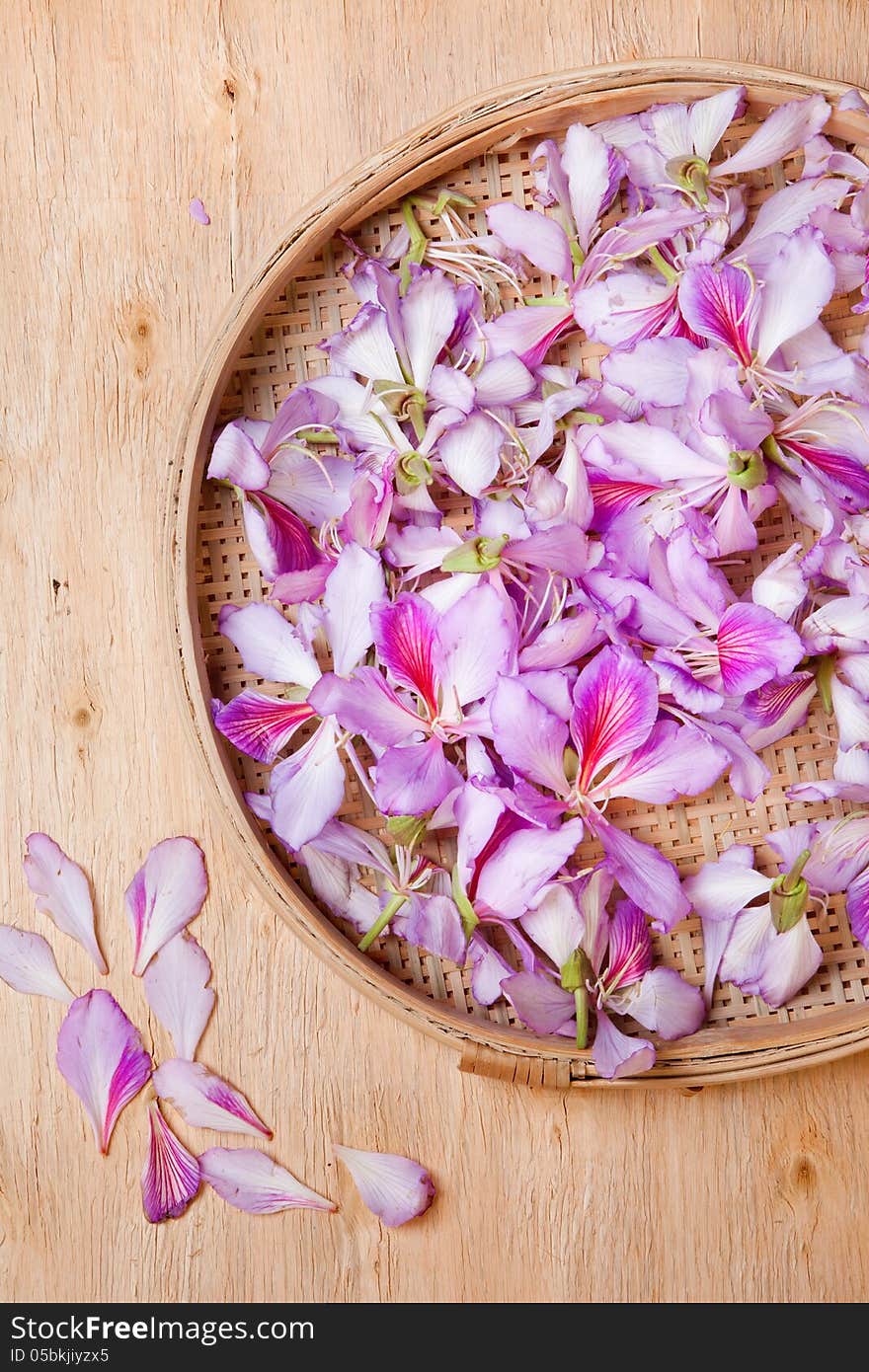 Bauhinia petals on old wooden board