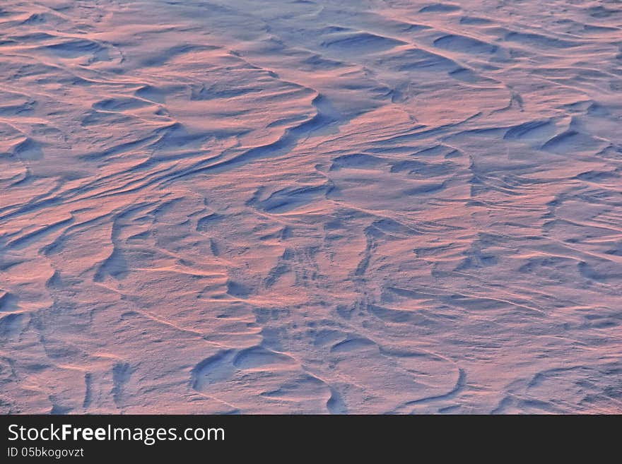 Surface texture of new fallen snow at sunset. Surface texture of new fallen snow at sunset