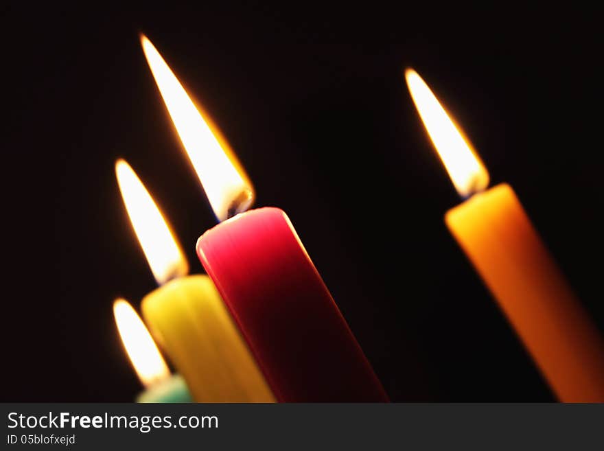 Multicolored Candles Burning