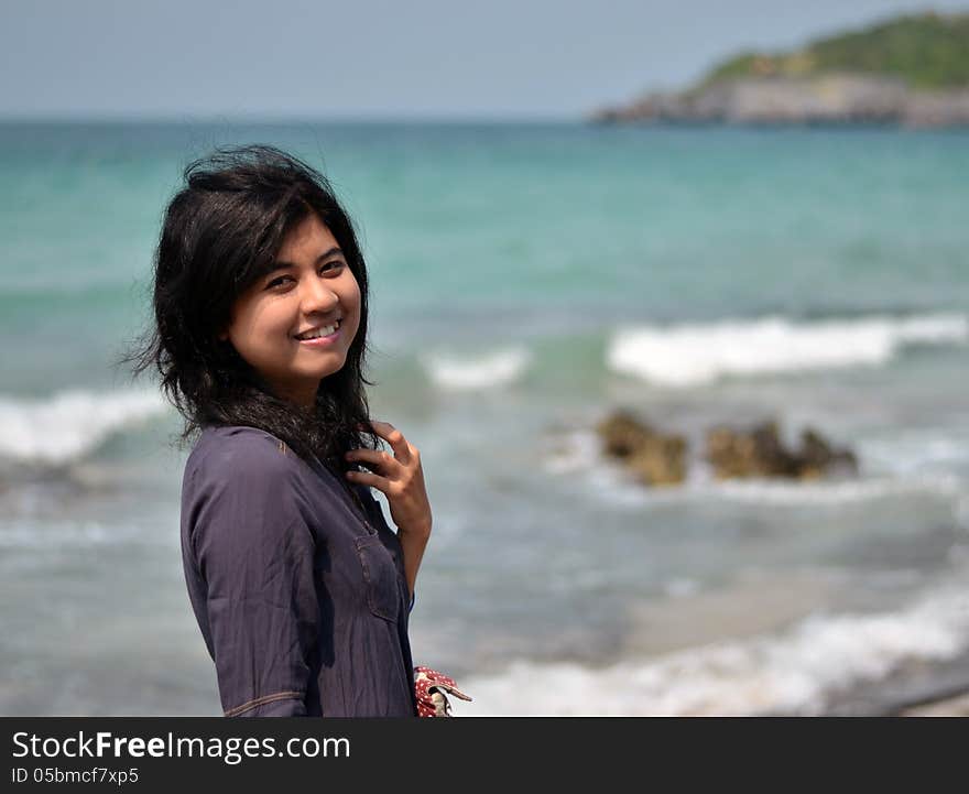 Beautiful young asian woman on beach summer holiday