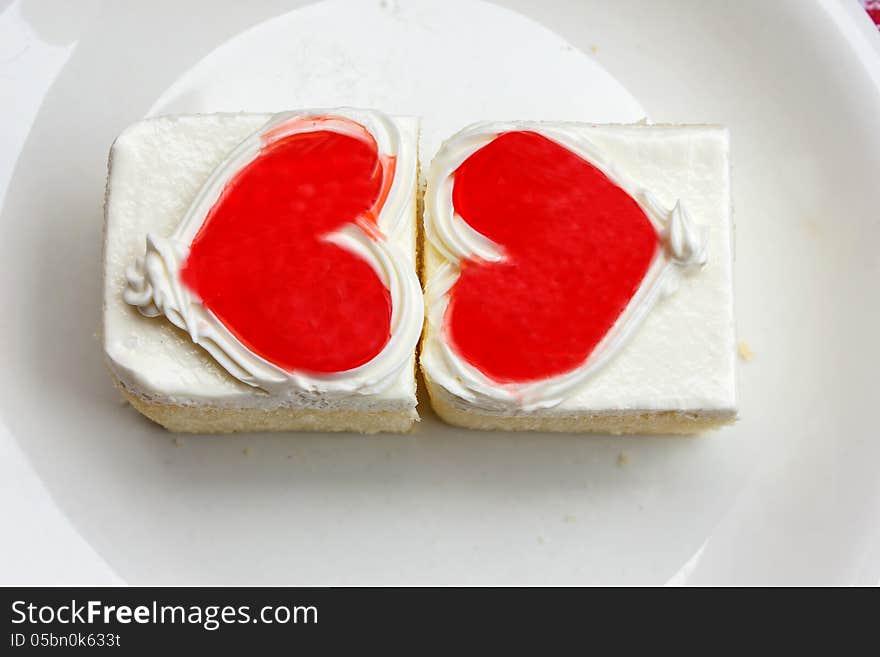 Beautiful cake red heart white background. Beautiful cake red heart white background